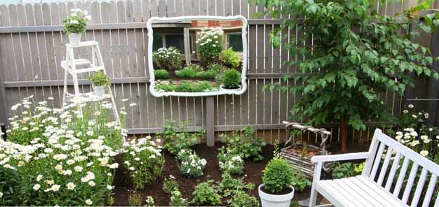 add a mirror to enlarge a small yard